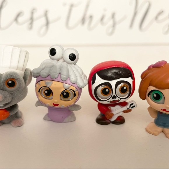 FREE w/purchase Pixar doorables | Young Carl & Ellie , Remy , Boo , Miguel - Picture 4 of 5